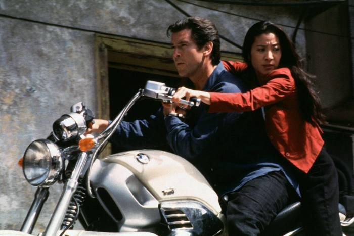 A man and a woman on a motorbike