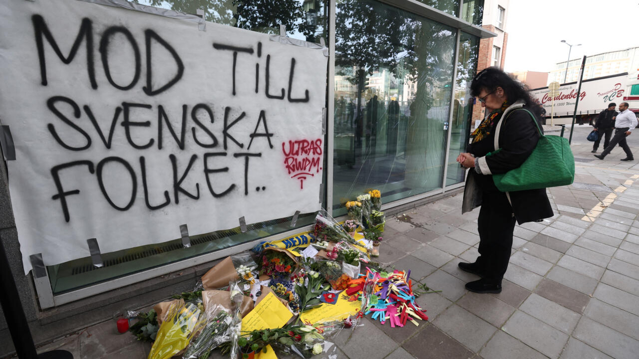 Paris court charges two suspects over Brussels football knife attackParis court charges two suspects over Brussels football knife attack