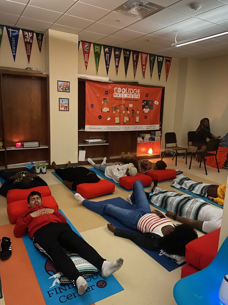 Members of Coolidge’s community participate in a guided meditation (photo courtesy of Kira Rowe)  